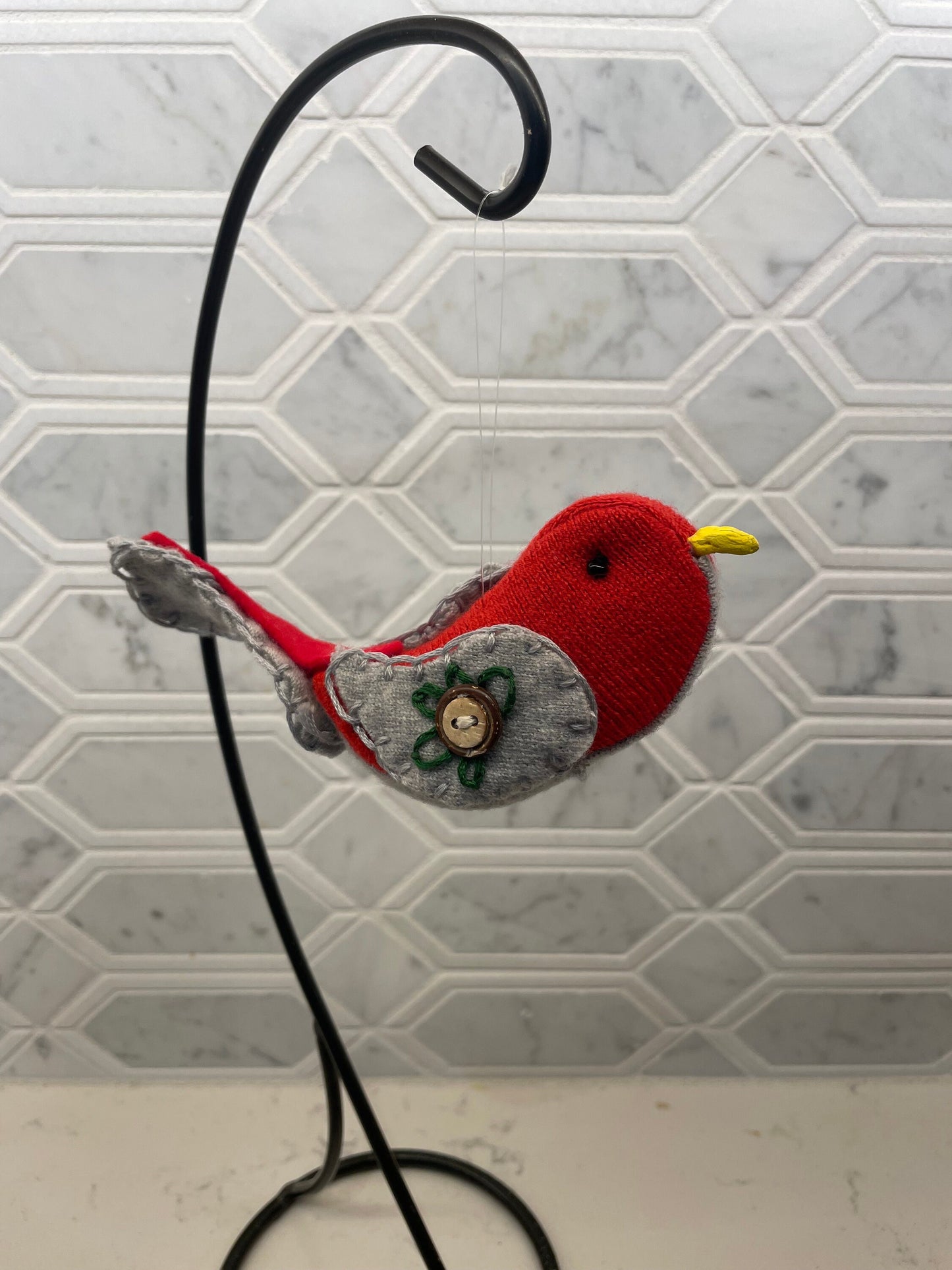 Buckeye bird (Red & Gray)ornament with a hand sewn buckeye on wings.Hang anywhere or sit on a shelf. It is said buckeyes are good-luck!