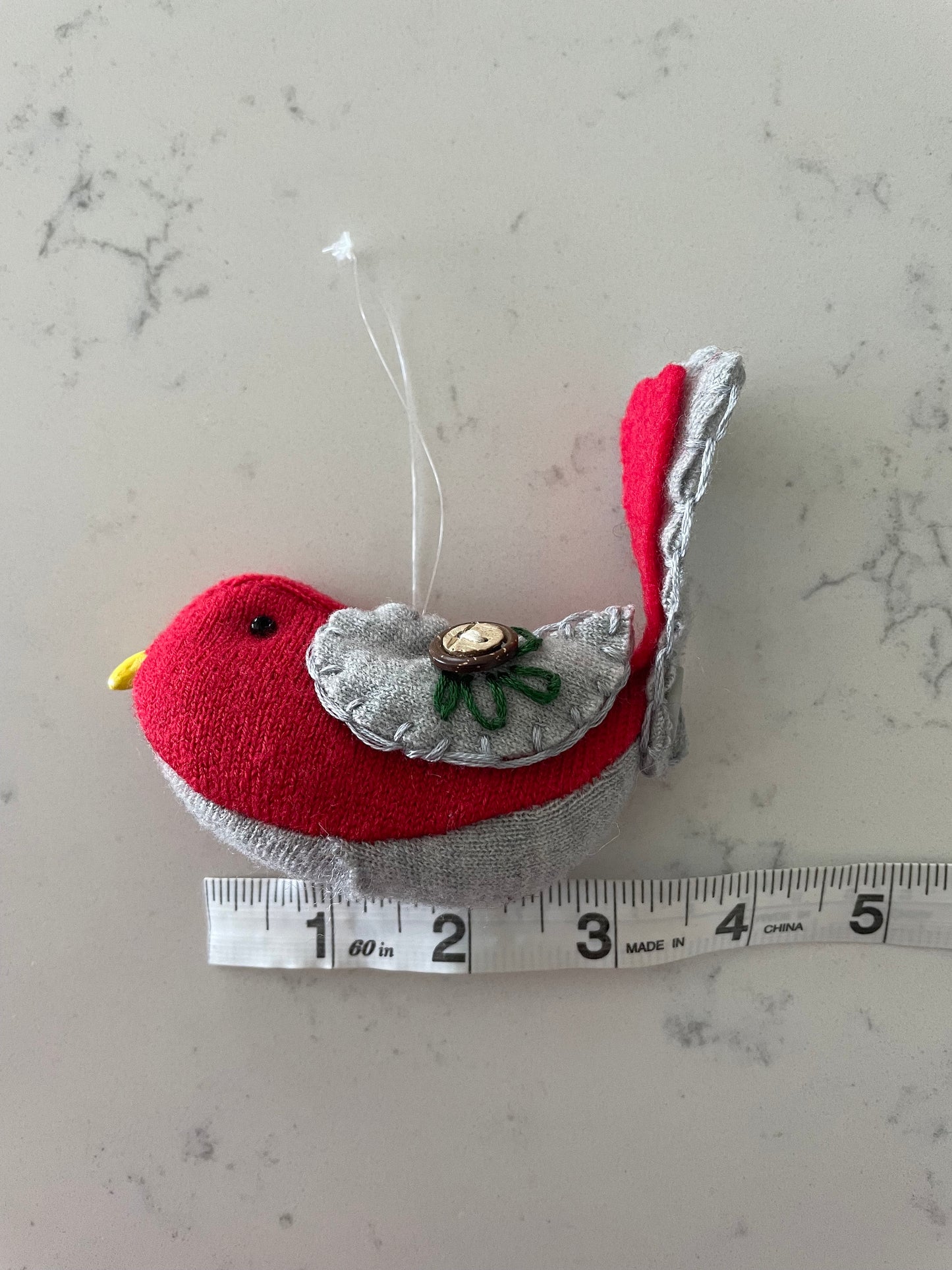 Buckeye bird (Red & Gray)ornament with a hand sewn buckeye on wings.Hang anywhere or sit on a shelf. It is said buckeyes are good-luck!