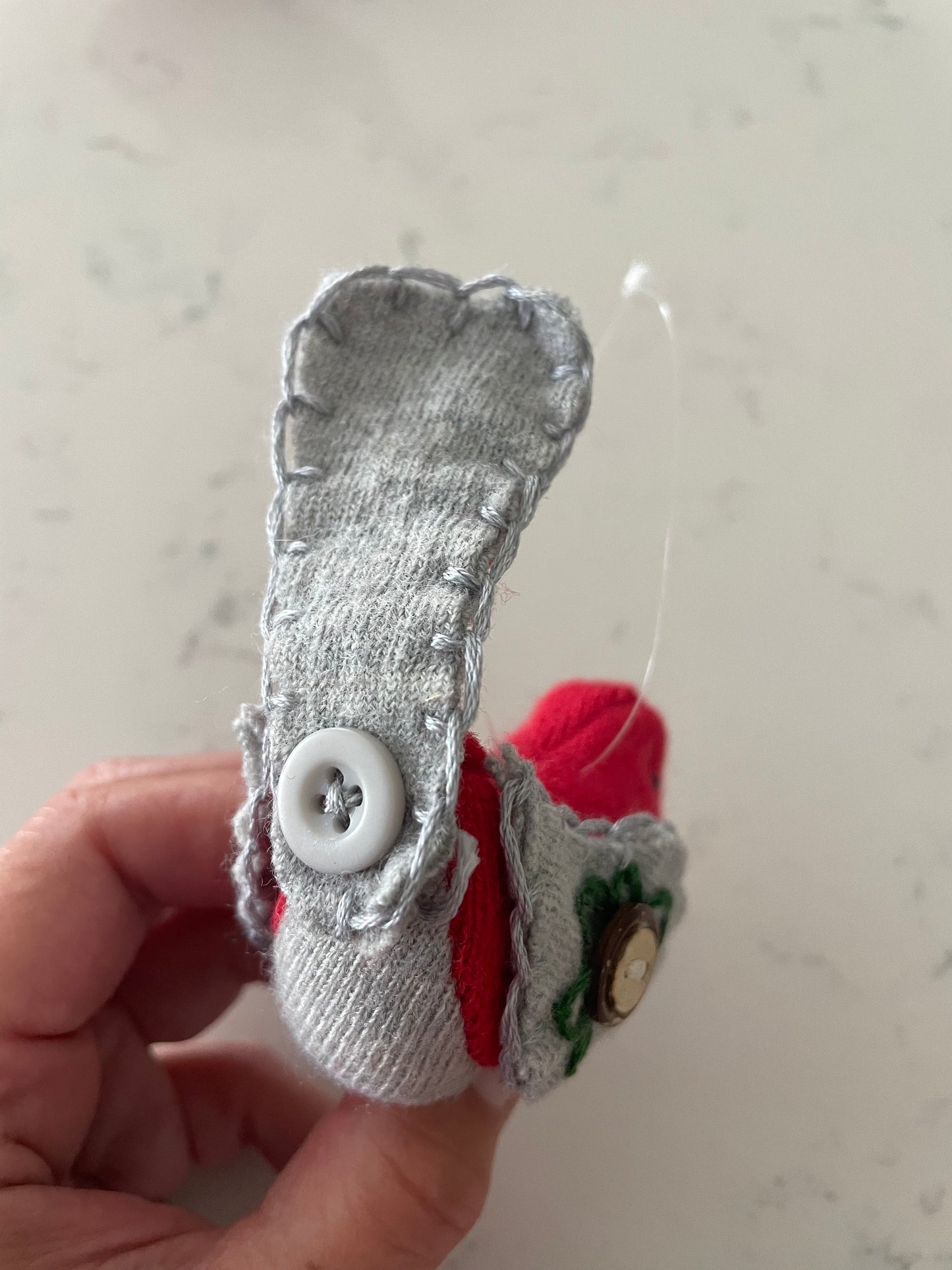 Buckeye bird (Red & Gray)ornament with a hand sewn buckeye on wings.Hang anywhere or sit on a shelf. It is said buckeyes are good-luck!