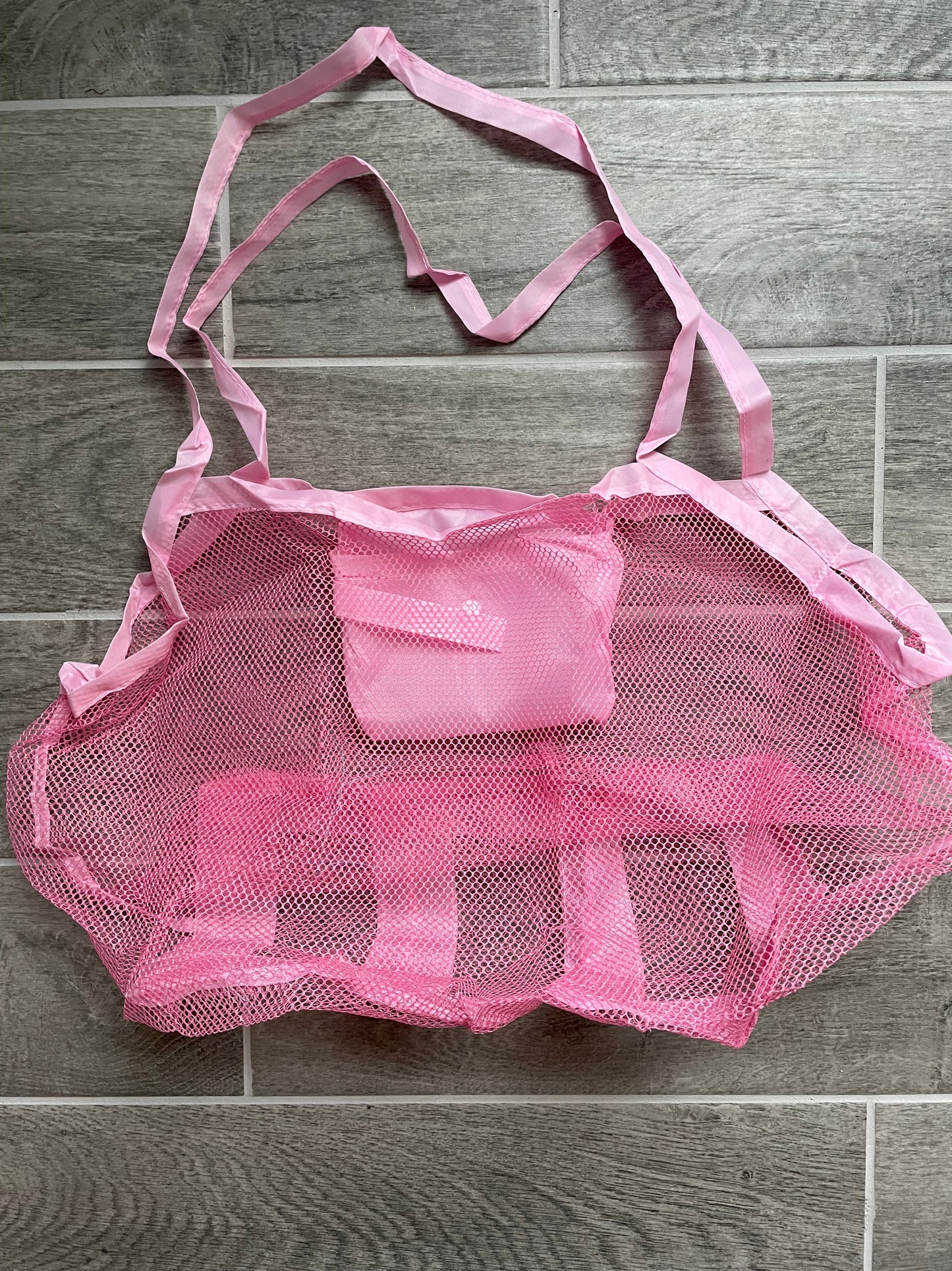 Lightweight travel bag, portable bag, expandable water resistant tote, pink or gray mesh bag that folds into 5 x 6 inch pouch with carrying strap