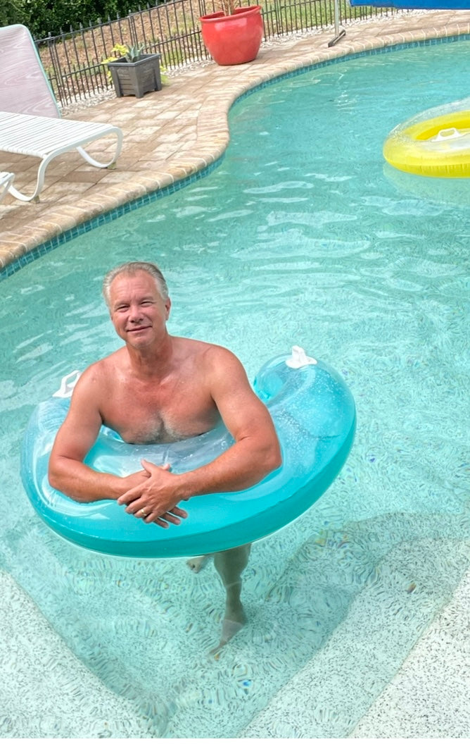 Inflatable seat water float with handles and drink holders